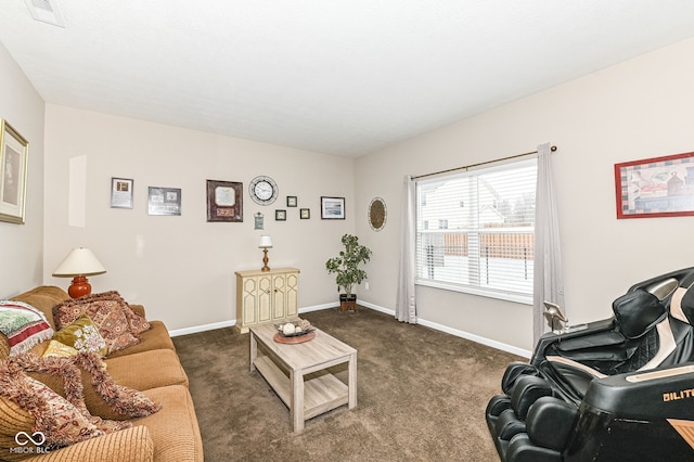 living room featuring dark colored carpet, visible vents, and baseboards