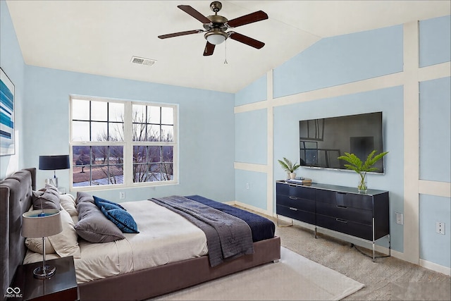 carpeted bedroom featuring vaulted ceiling, a ceiling fan, visible vents, and baseboards