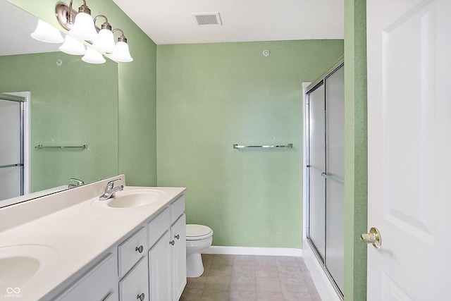 full bath featuring a stall shower, visible vents, and a sink