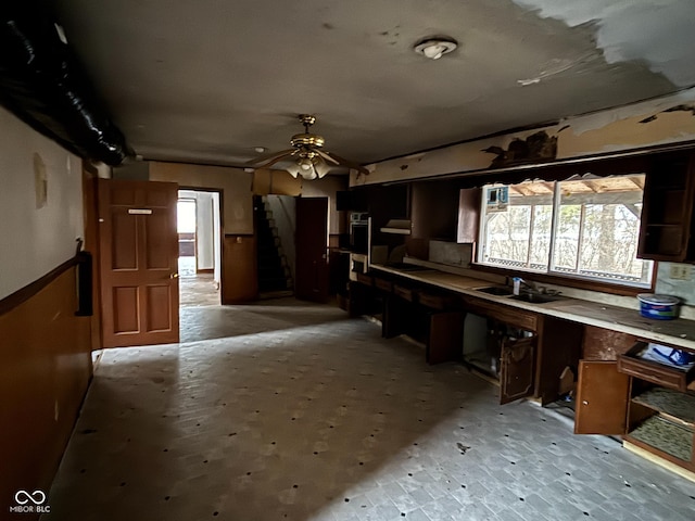 kitchen featuring sink and ceiling fan