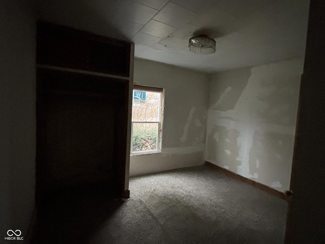 unfurnished bedroom featuring carpet