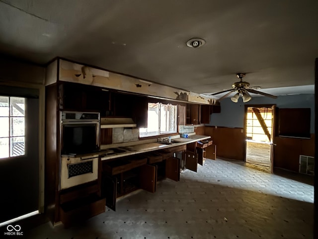 kitchen with ceiling fan and sink