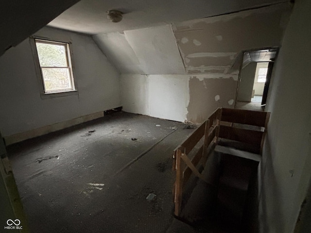 bonus room featuring lofted ceiling