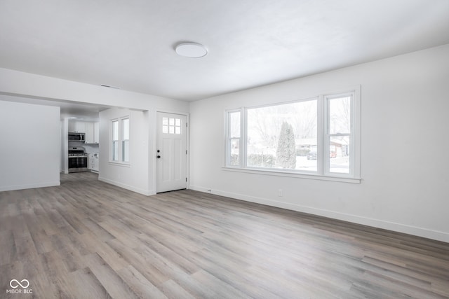 entrance foyer featuring light wood-type flooring