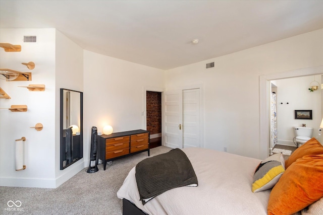 bedroom with light carpet, visible vents, and baseboards