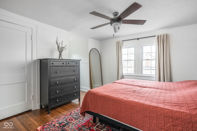 bedroom featuring dark wood-type flooring and ceiling fan