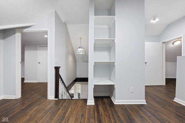 hall with dark hardwood / wood-style floors