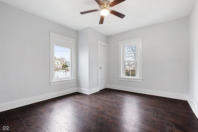 unfurnished bedroom with dark hardwood / wood-style floors and ceiling fan