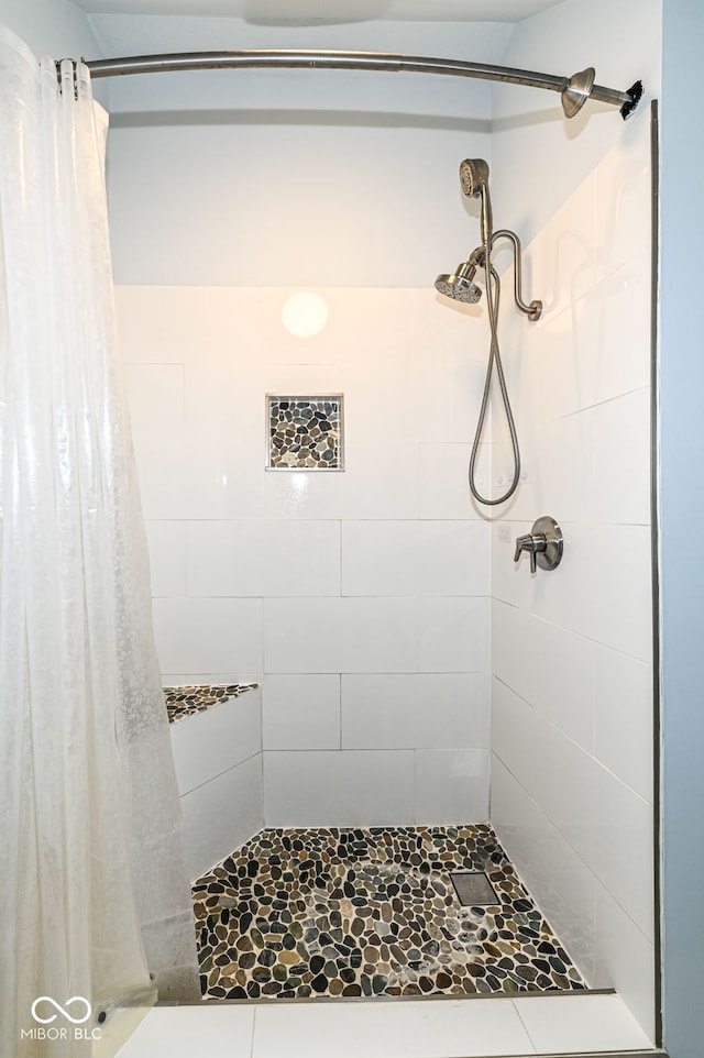 bathroom featuring walk in shower