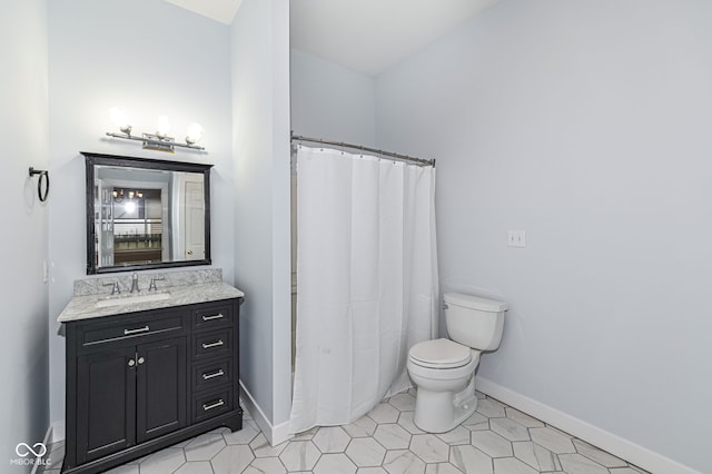 bathroom with vanity, a shower with curtain, tile patterned floors, and toilet