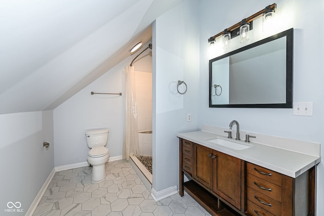 bathroom featuring lofted ceiling, tile patterned flooring, vanity, curtained shower, and toilet