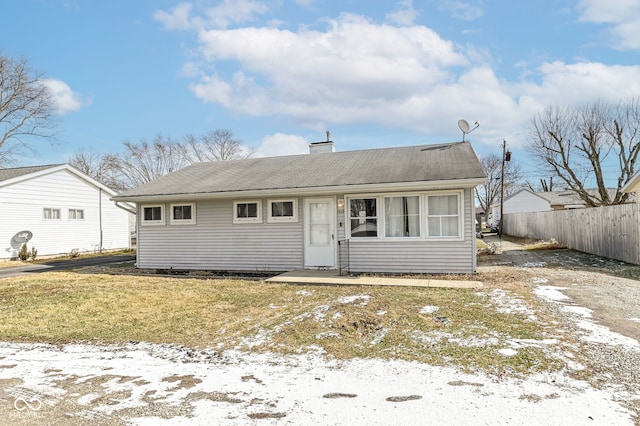 view of front of house with a yard