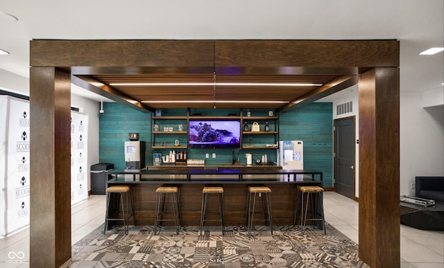 bar with tile patterned floors