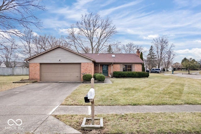 ranch-style house with brick siding, a chimney, a garage, driveway, and a front lawn