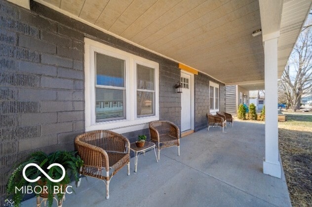 227 W 7th St, Lapel, IN 46051 - view of patio featuring a porch