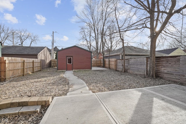 view of yard with an outbuilding and a patio