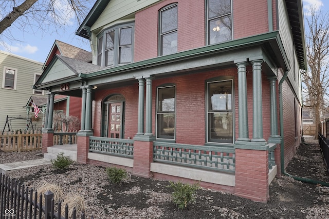 view of property exterior featuring covered porch