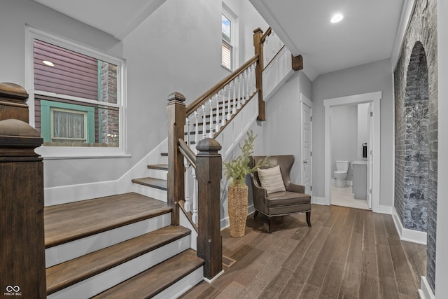 staircase featuring hardwood / wood-style floors