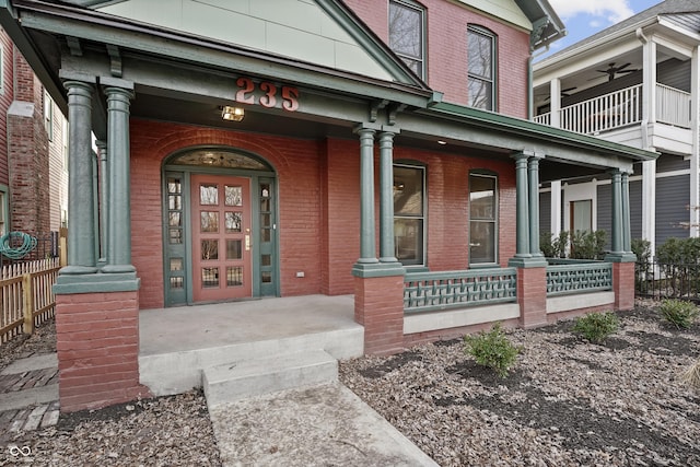 entrance to property featuring covered porch