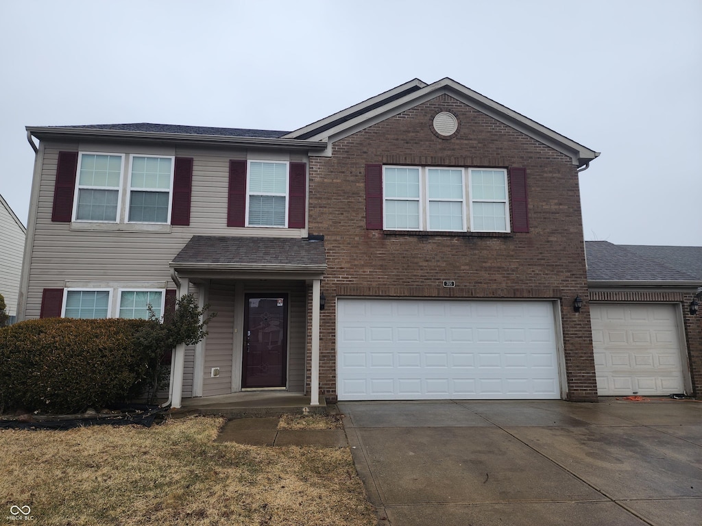 view of front of property with a garage