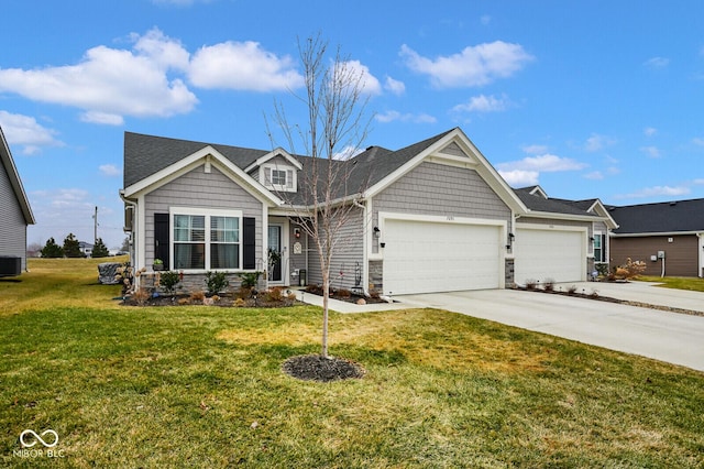 craftsman-style home featuring a garage, central air condition unit, and a front lawn