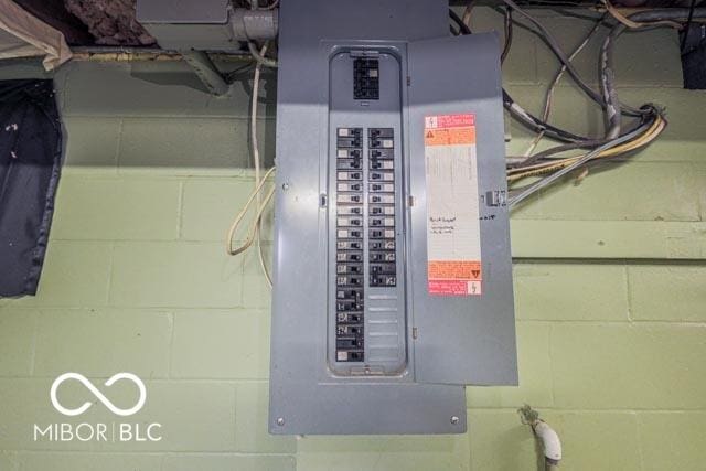 utility room featuring electric panel