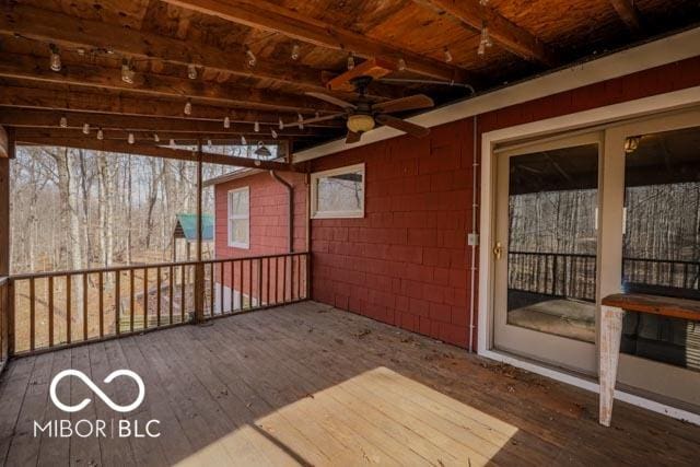 wooden deck with ceiling fan