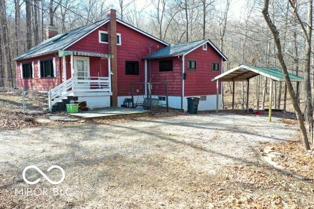 view of front of property with a carport