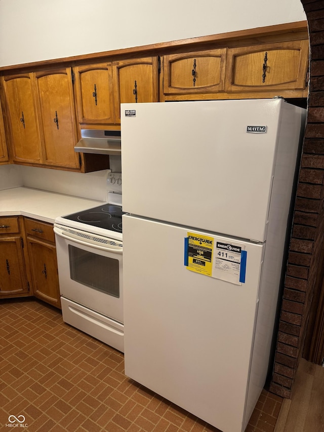 kitchen featuring white appliances