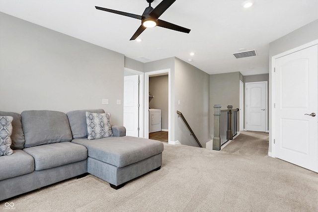 carpeted living area with ceiling fan, recessed lighting, baseboards, washer / dryer, and visible vents