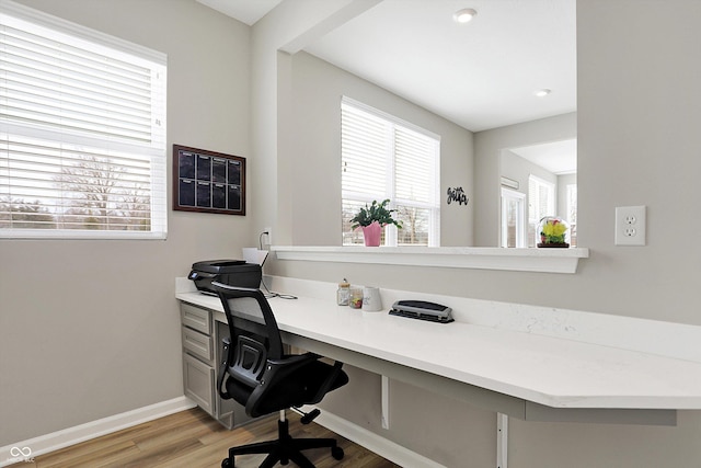 office area featuring light wood-style floors, recessed lighting, and baseboards