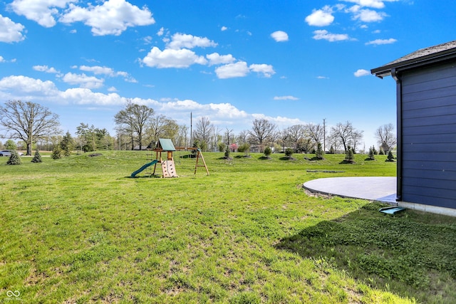 view of yard with a playground