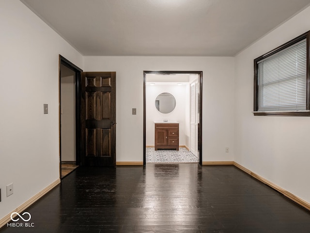 empty room featuring dark hardwood / wood-style floors