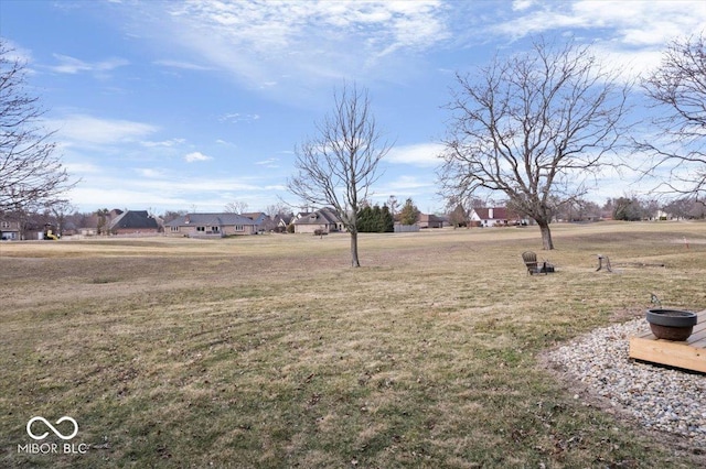 view of yard featuring a residential view