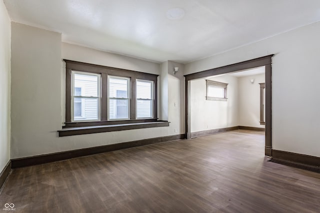 3543 N Kenwood Ave, Indianapolis, IN 46208 - spare room featuring wood finished floors and plenty of natural light