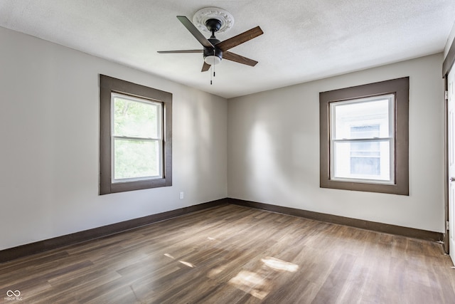 3543 N Kenwood Ave, Indianapolis, IN 46208 - empty room with wood finished floors, a ceiling fan, and a textured ceiling