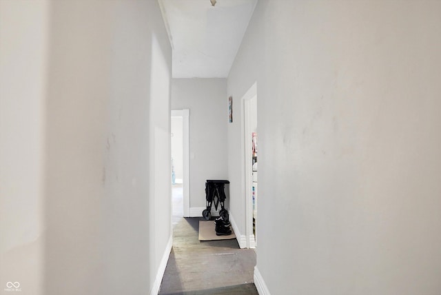 corridor featuring hardwood / wood-style floors