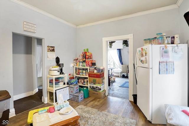 playroom with hardwood / wood-style flooring and ornamental molding