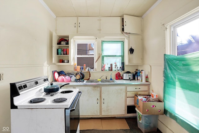 kitchen featuring white cabinetry, ornamental molding, sink, and white range with electric cooktop