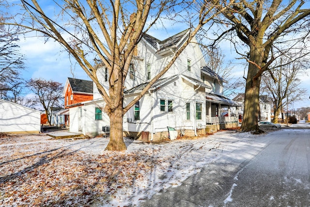 view of snow covered property