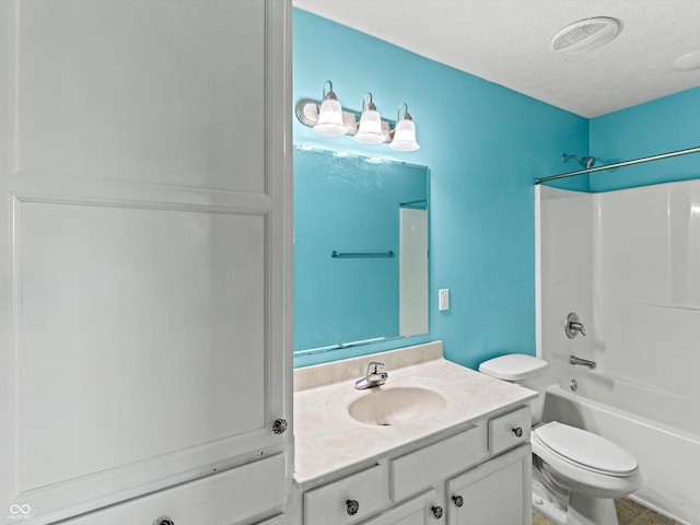 bathroom with visible vents, toilet, vanity, shower / tub combination, and a textured ceiling