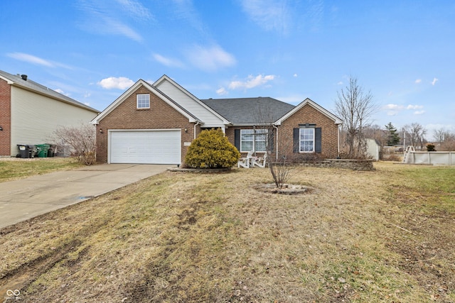 view of front of property featuring driveway, a garage, a front yard, and brick siding