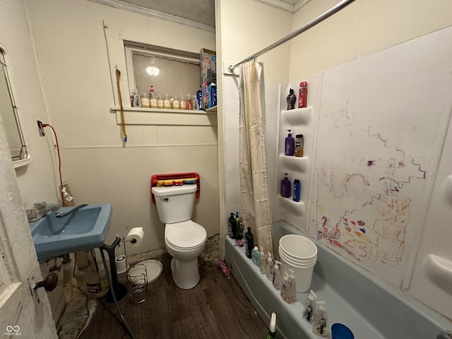 full bathroom featuring toilet, sink, shower / bathtub combination with curtain, and hardwood / wood-style floors