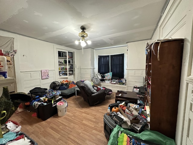 bedroom featuring ceiling fan and light hardwood / wood-style flooring