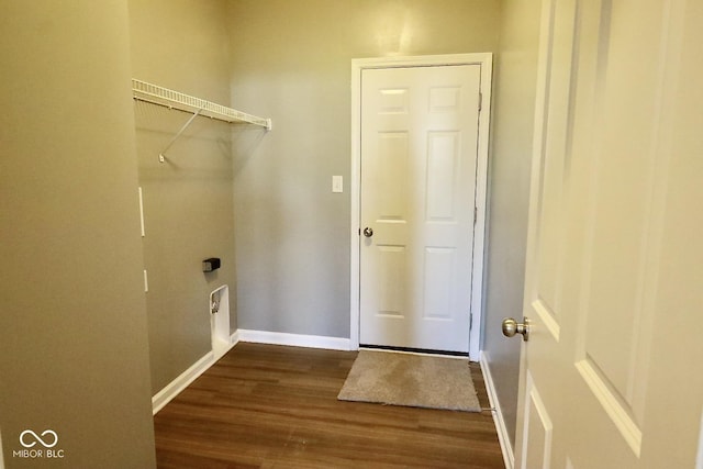 clothes washing area with hookup for an electric dryer and dark hardwood / wood-style floors