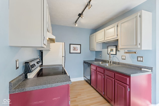 kitchen with sink, stainless steel range with electric cooktop, dishwasher, white fridge, and white cabinets