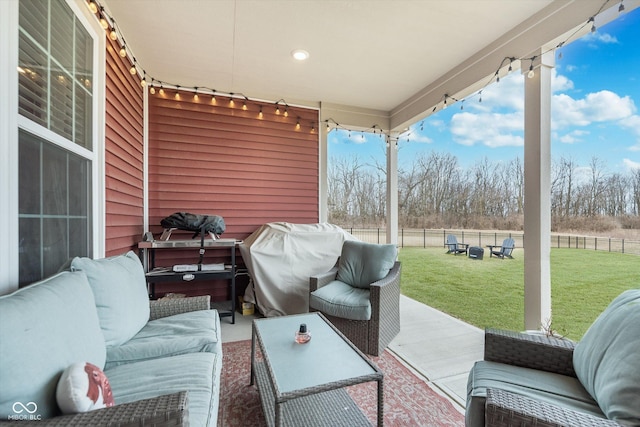 view of patio featuring fence, an outdoor hangout area, and area for grilling