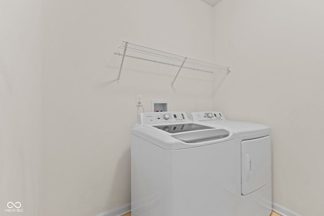 laundry area featuring washing machine and dryer