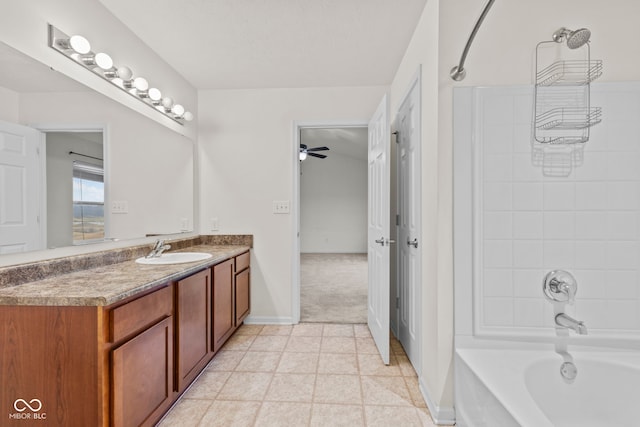 bathroom featuring vanity, shower / washtub combination, and ceiling fan