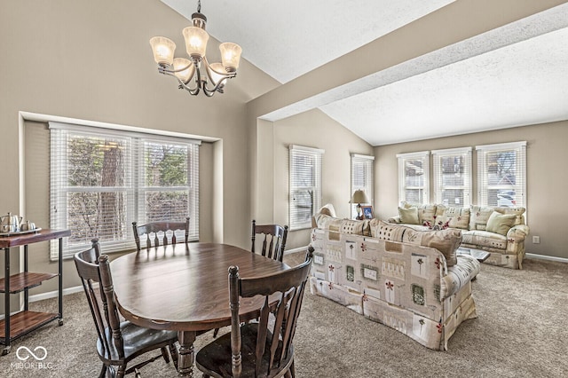 carpeted dining space with lofted ceiling, a wealth of natural light, a textured ceiling, and an inviting chandelier